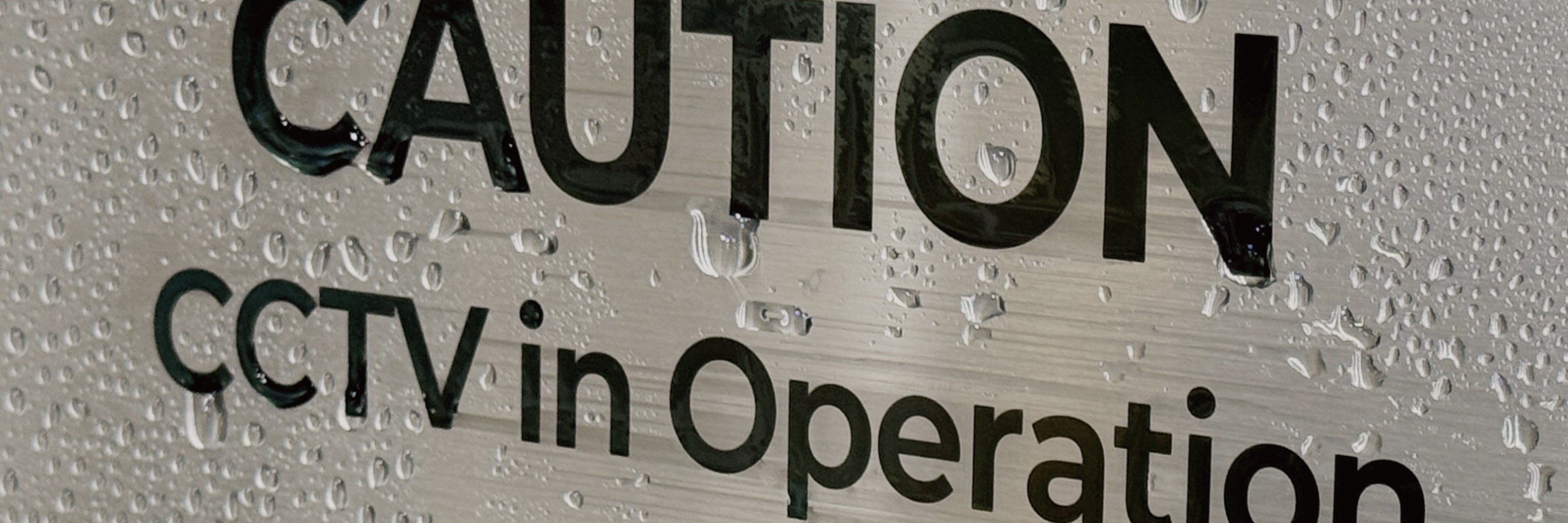 Stainless steel pictogram wall signs from the CODE Collection showing caution and information icons