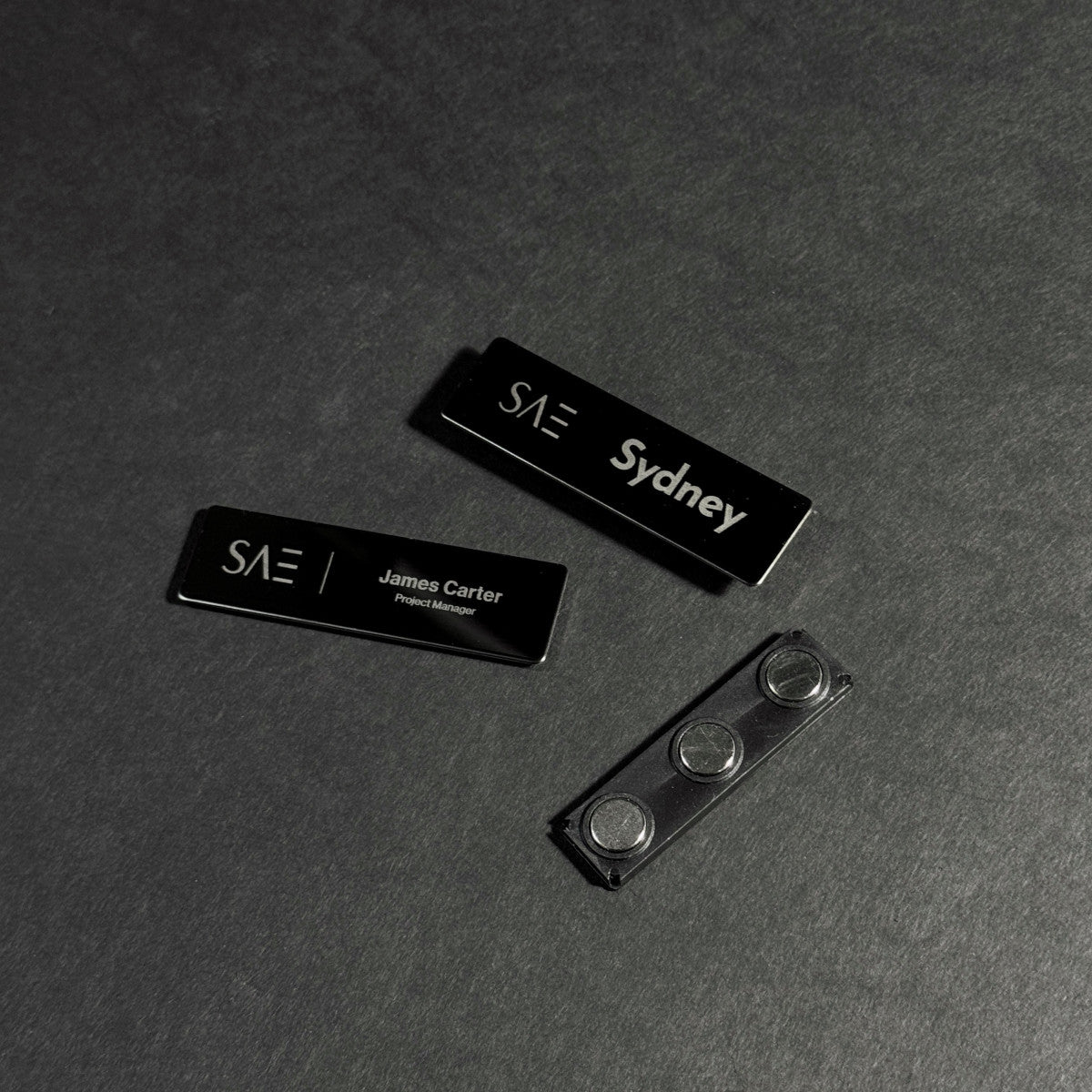 Black stainless steel laser engraved magnetic name badge, durable metal staff tag