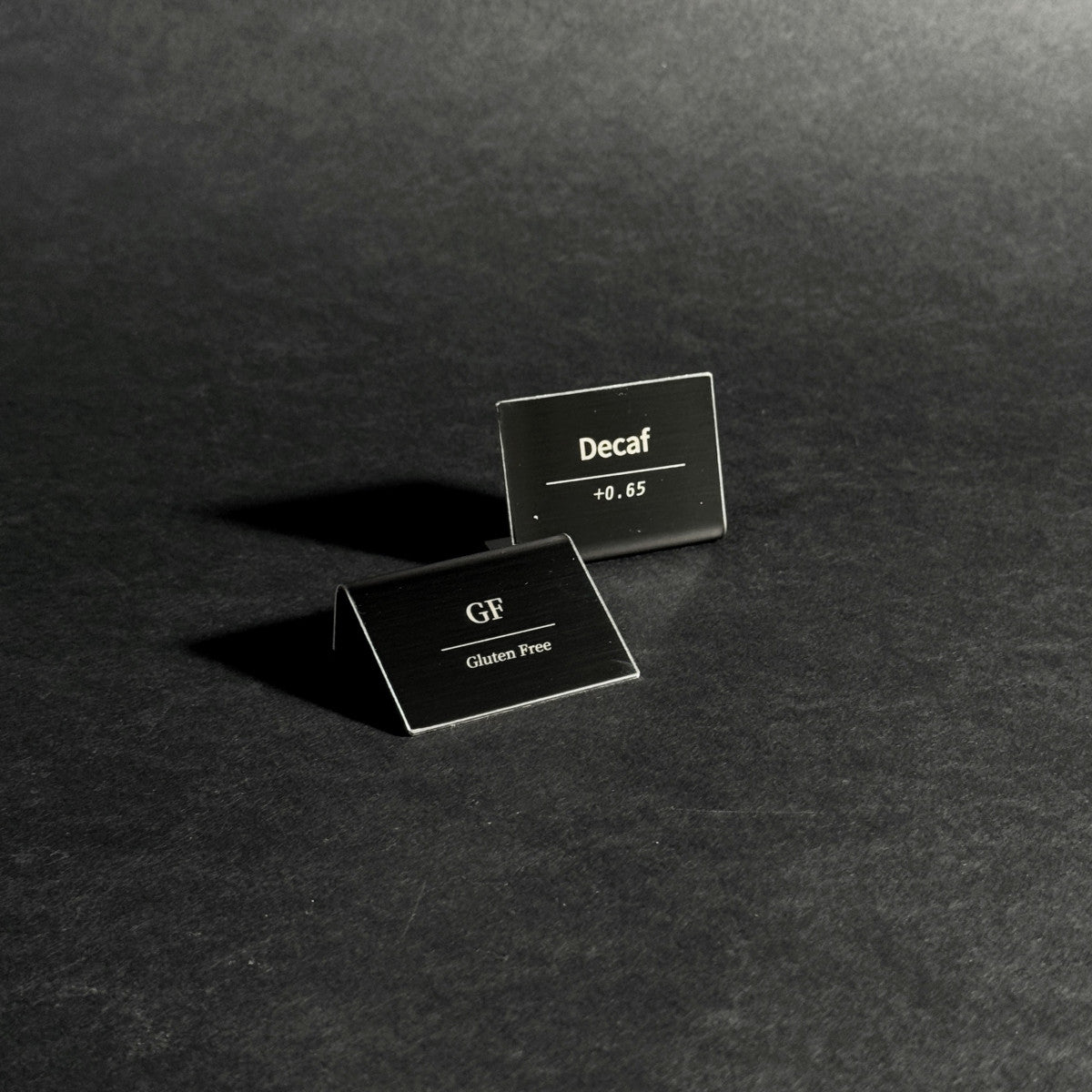 Bent Metal Laser Marked Price Tag Black 50x35mm for bakery display and cafe menu labeling