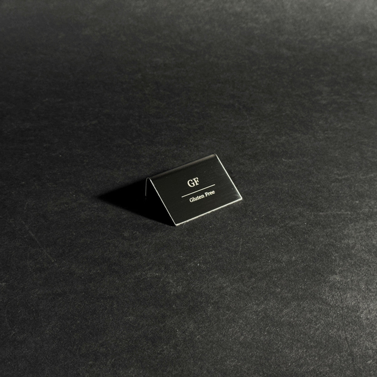 Bent Metal Laser Marked Price Tag Black 50x35mm for bakery display and cafe menu labeling