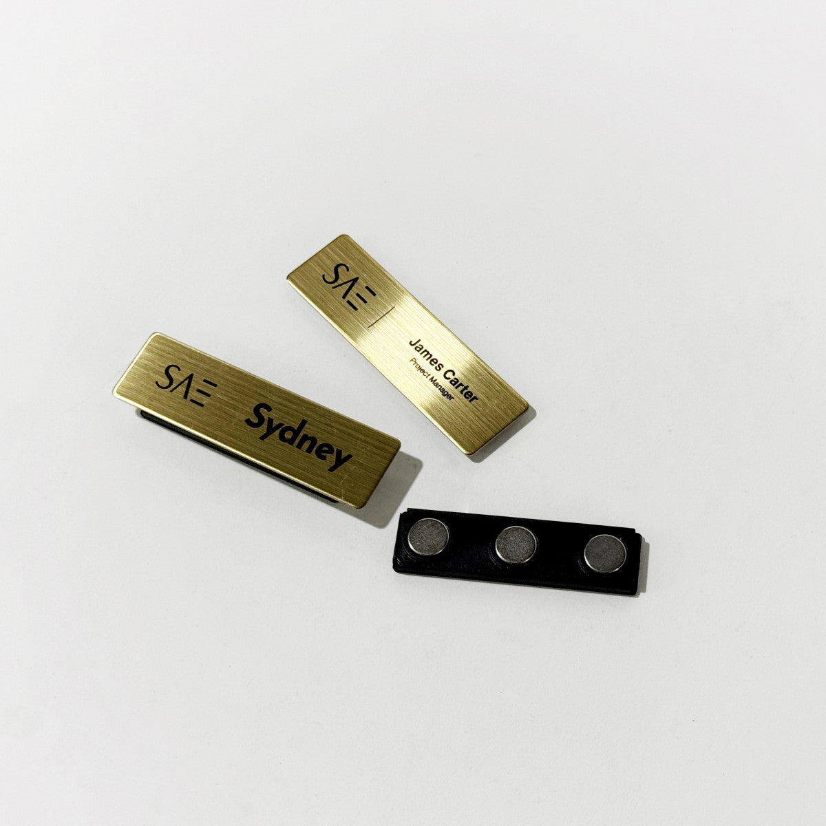 Gold stainless steel laser engraved magnetic name badge for employees
