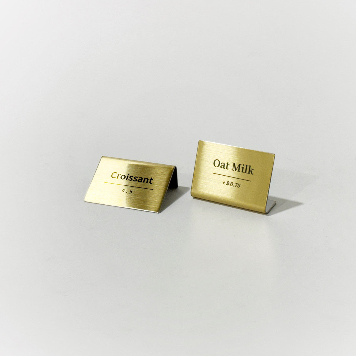 Bent Metal Laser Marked Price Tag Gold 50x35mm for bakery display and cafe menu labeling
