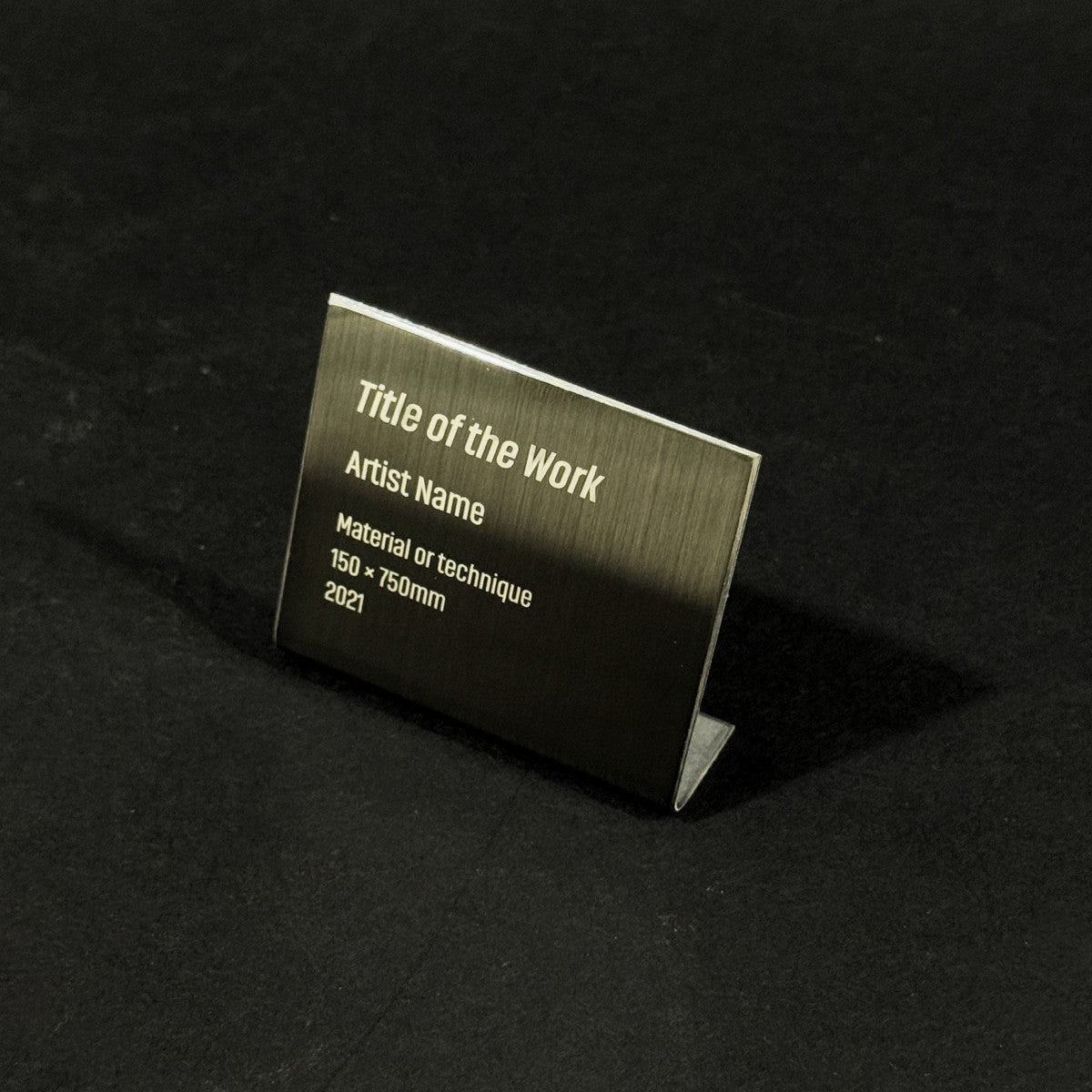 Stainless steel caption plate, black, 60×20×50mm from SIDE collection
