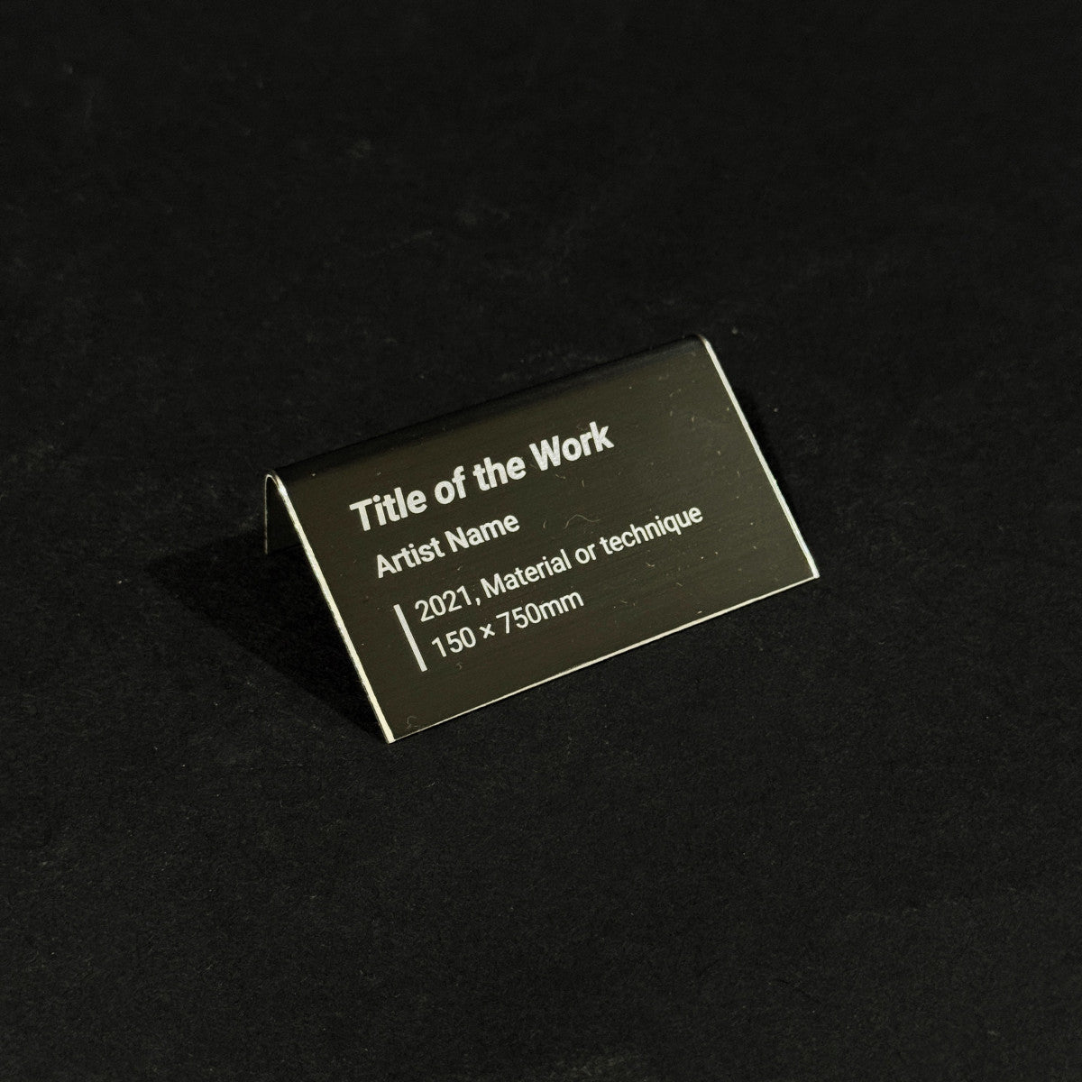 Stainless steel caption plate, black, 70×20×40mm from SIDE collection
