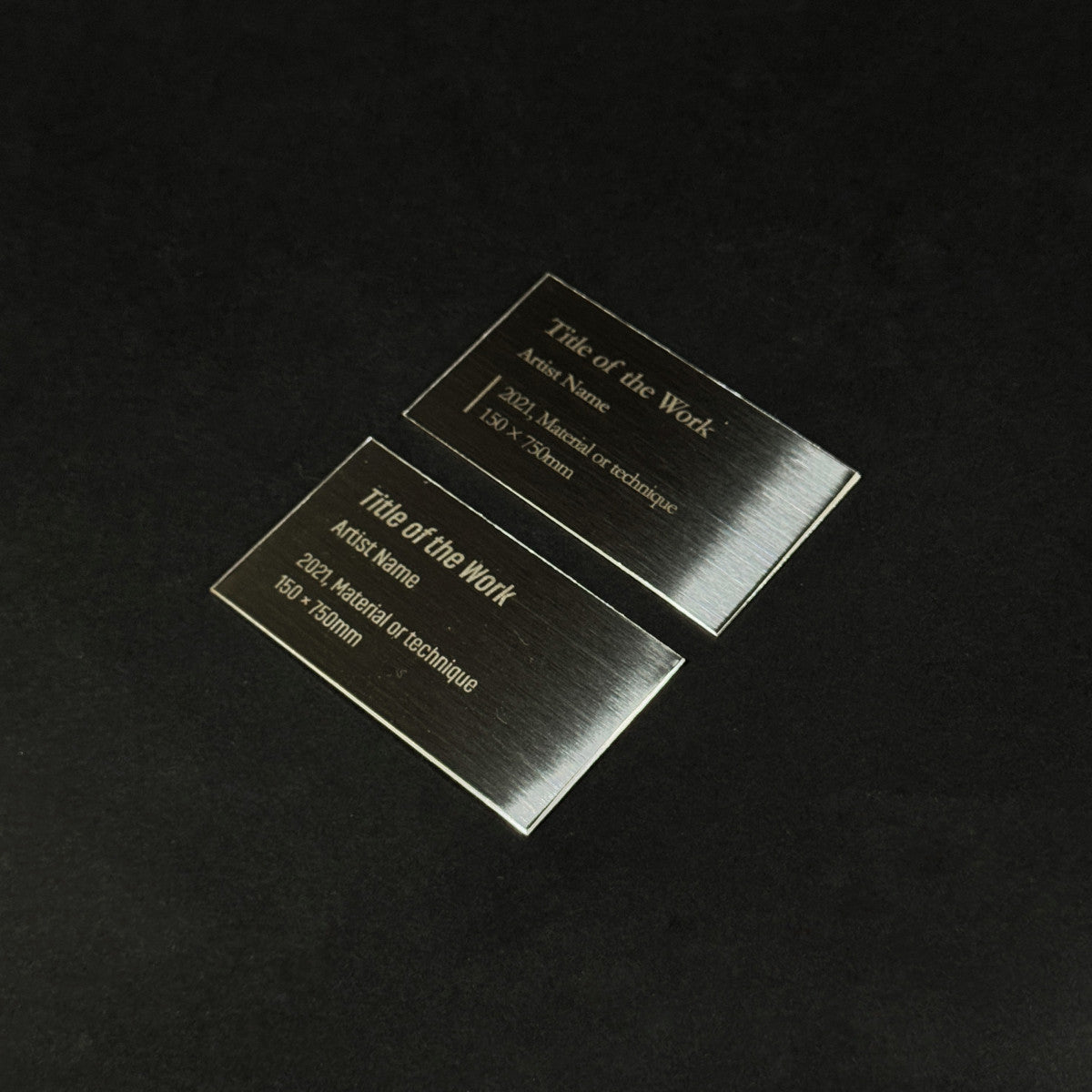 Stainless steel caption plate, black, 70×40mm from SIDE collection
