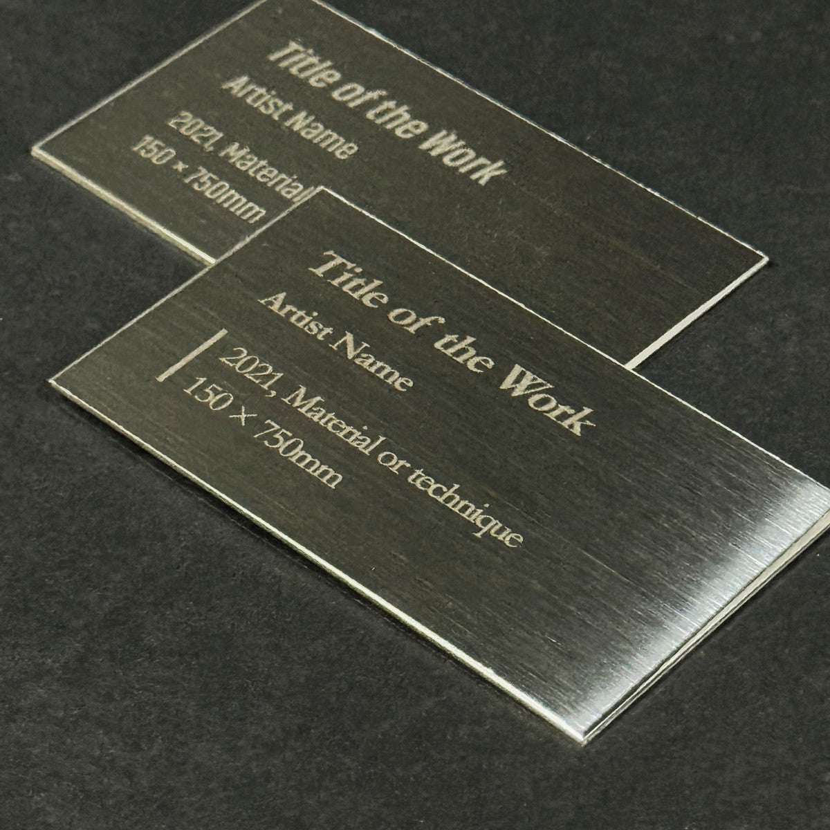 Stainless steel caption plate, black, 70×40mm from SIDE collection
